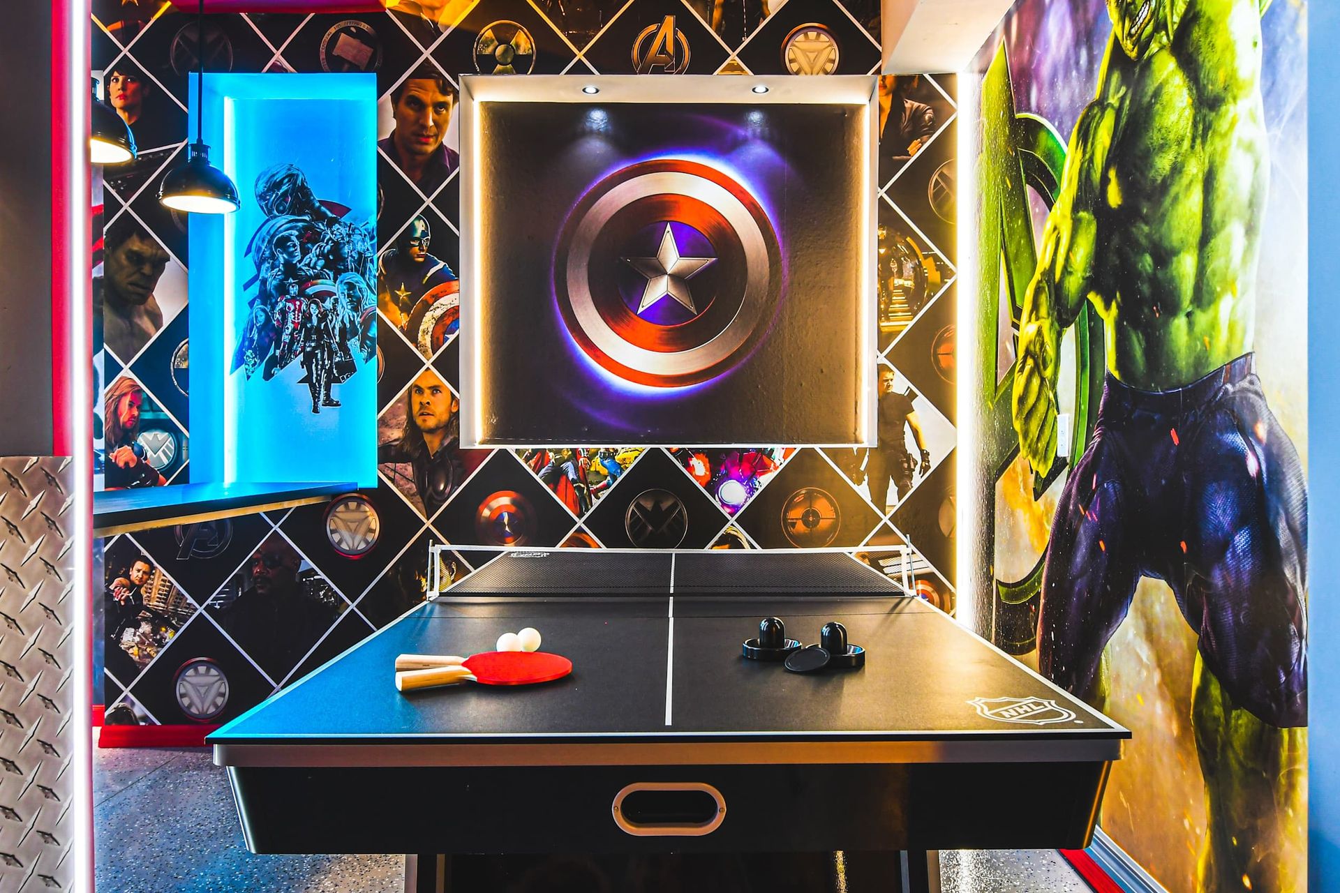 Heroic game zone with ping pong and Hulk-sized fun—perfect for Marvel fans!