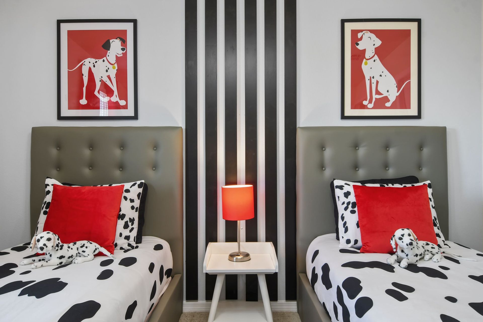 Chic Dalmatian twin room with playful spots, bold stripes, and vibrant accents.