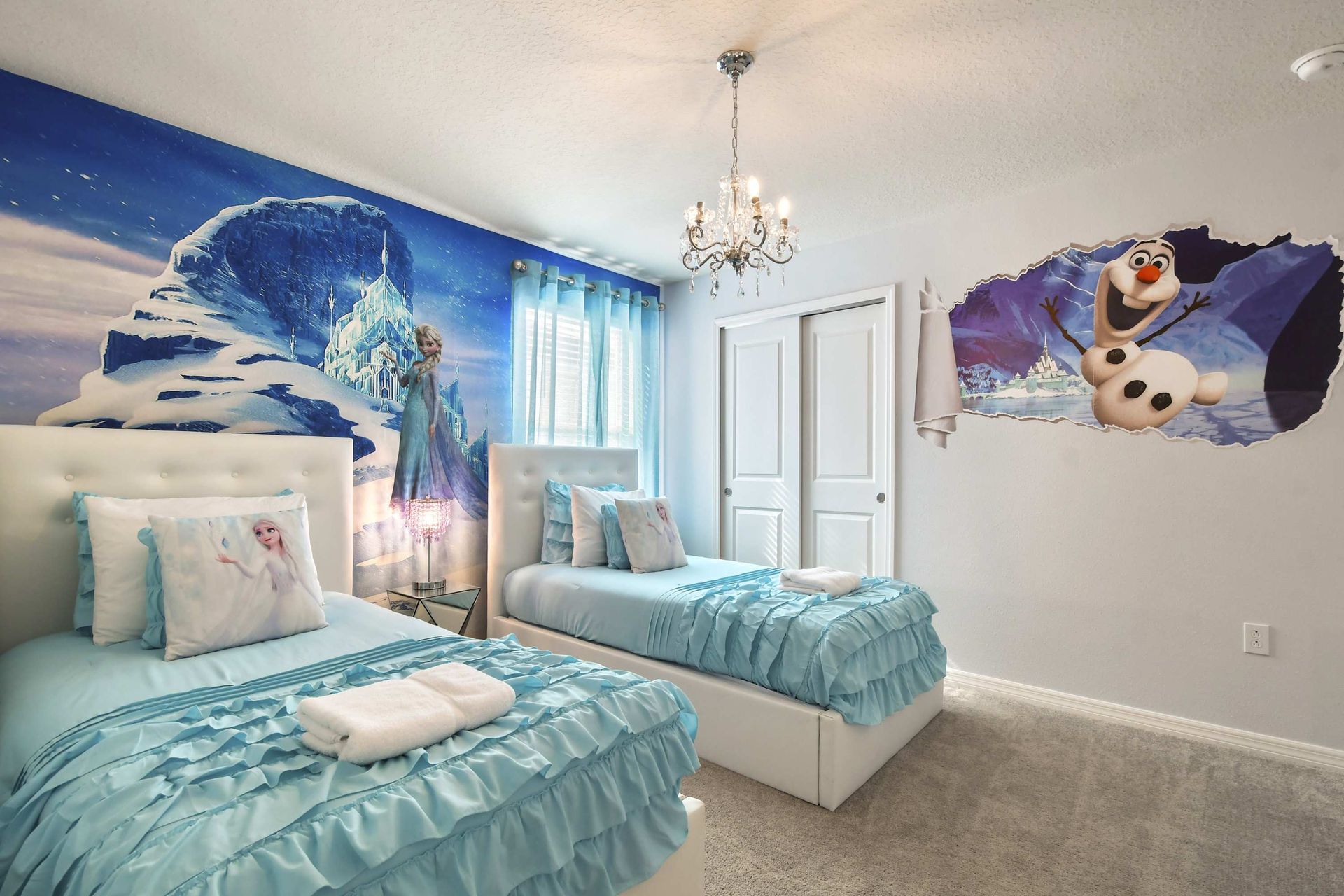 Frozen-themed dream room with twin beds, perfect for kids and magical stays.