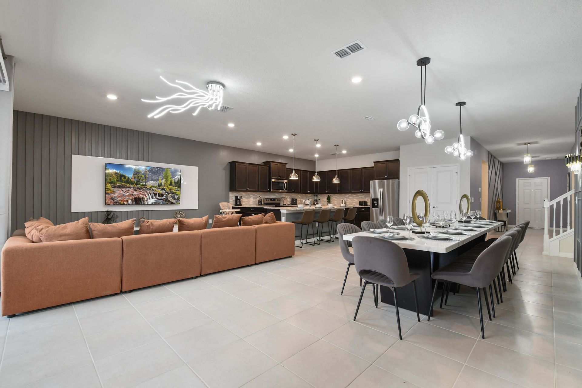 Elegant open-plan layout with gourmet kitchen, luxe dining, and stylish lounge area.