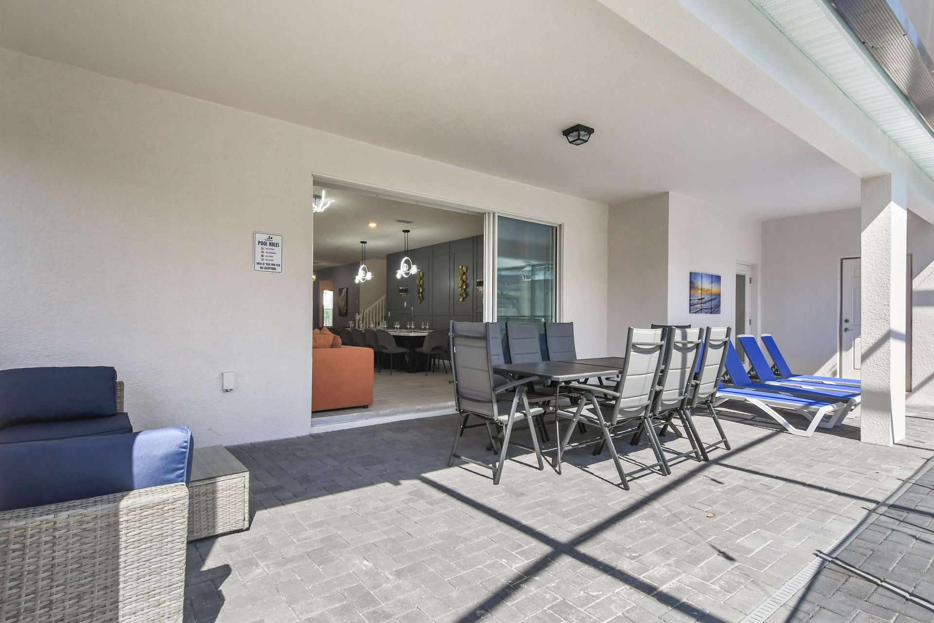 Spacious outdoor area with dining and lounging, just steps from the kitchen.