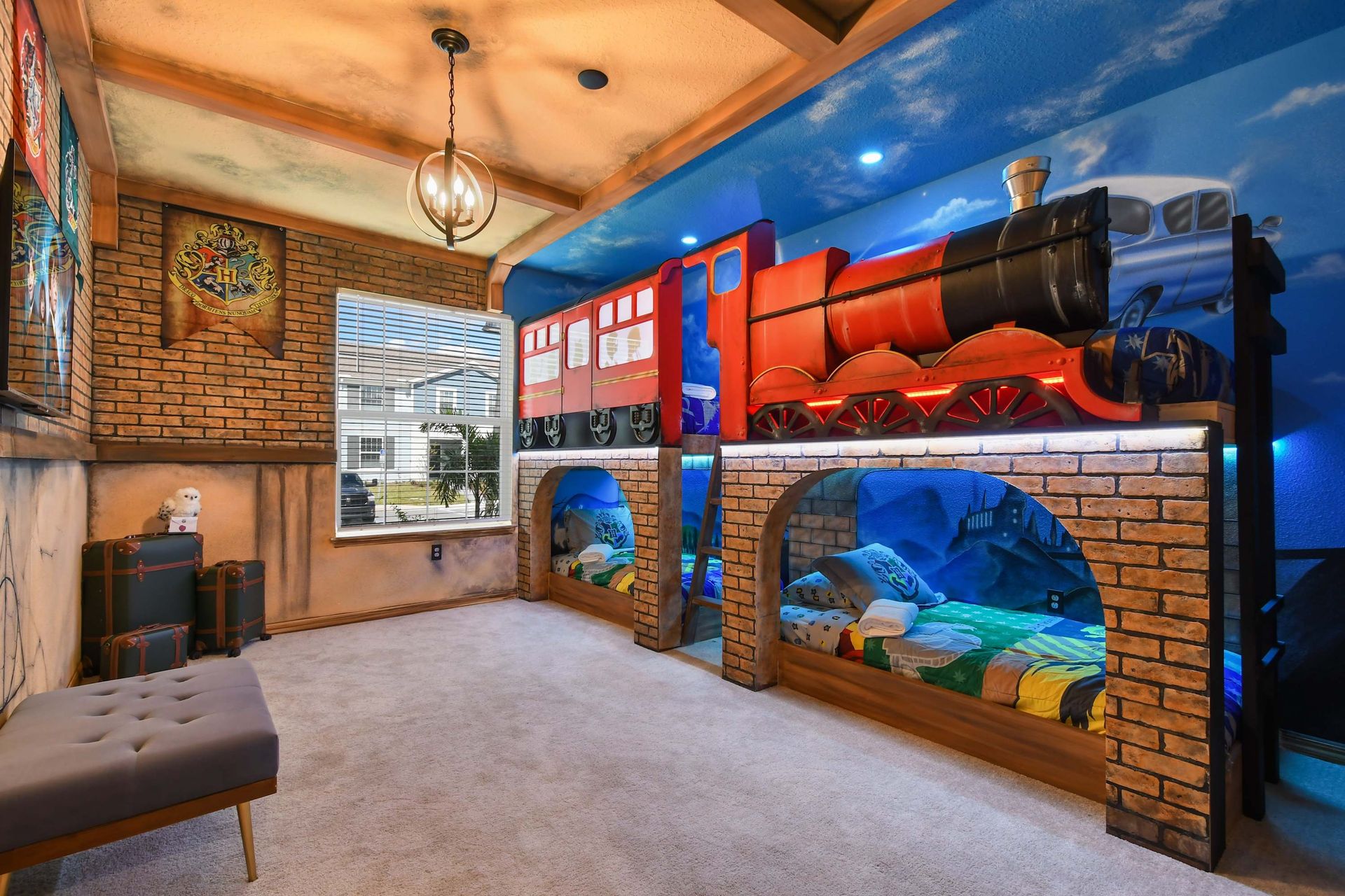 Magical Harry Potter-themed room with train bunk beds and enchanting decor.