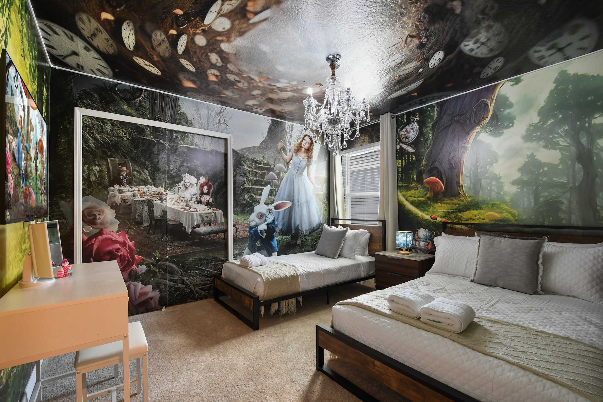 Enter a whimsical world in this Alice in Wonderland-themed bedroom, complete with stunning murals and elegant furnishings for a magical stay.