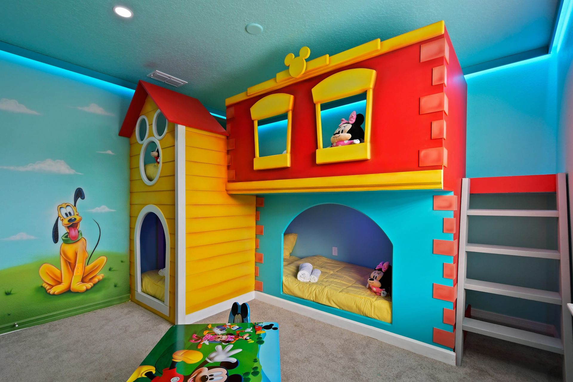 Whimsical Mickey Mouse Clubhouse room with cozy bunks and vibrant decor.