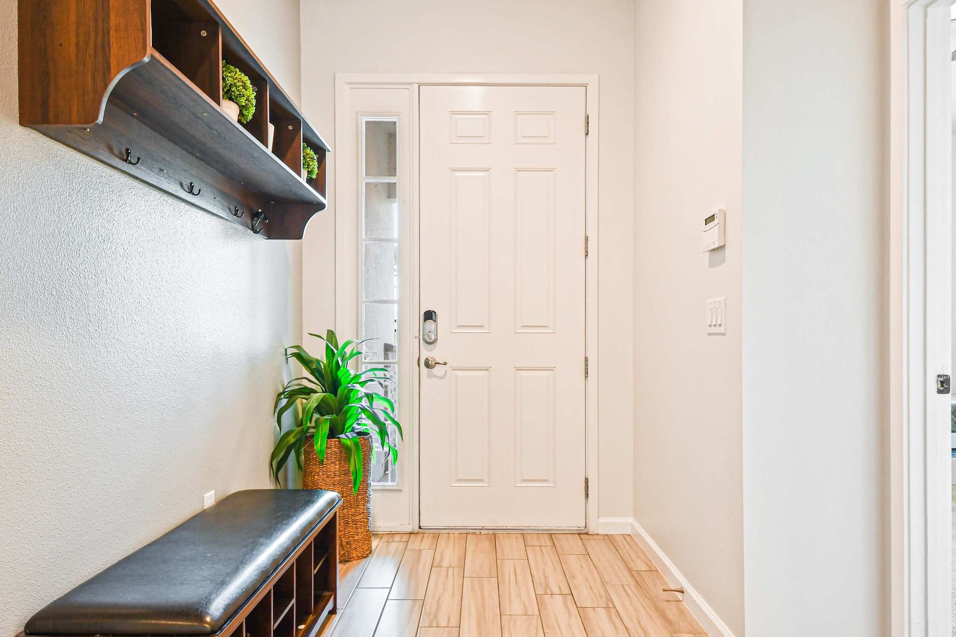 Bright entryway with modern decor and sleek design