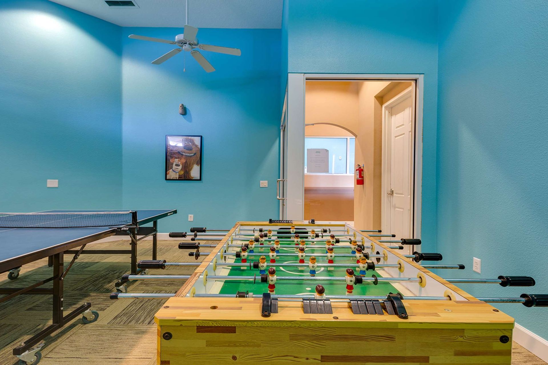 Game room fun with foosball, ping pong, and vibrant, family-friendly vibes!
