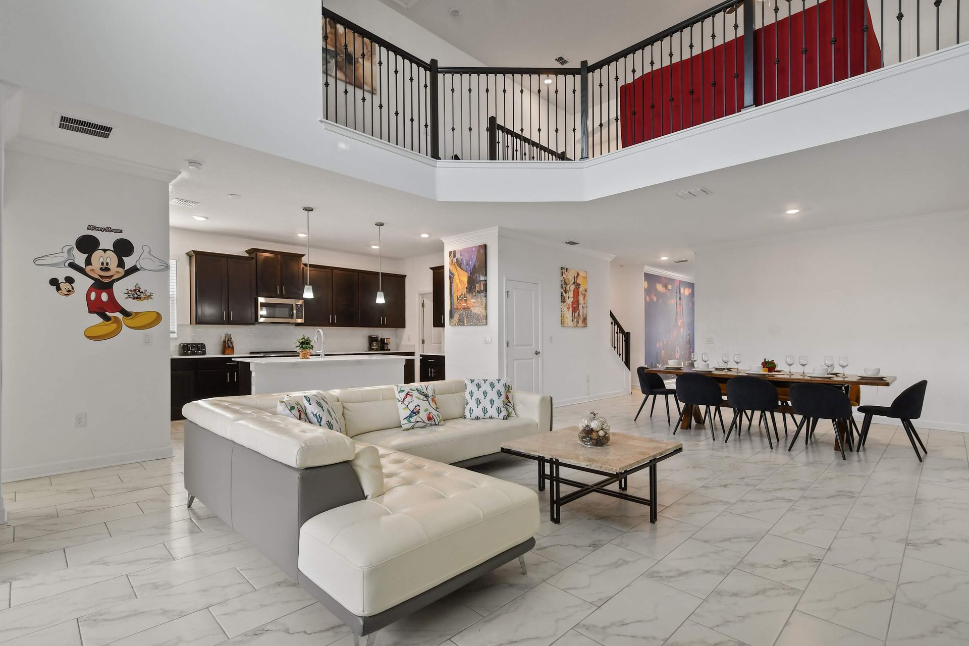 Spacious open-concept layout with Disney charm, ideal for family gatherings.