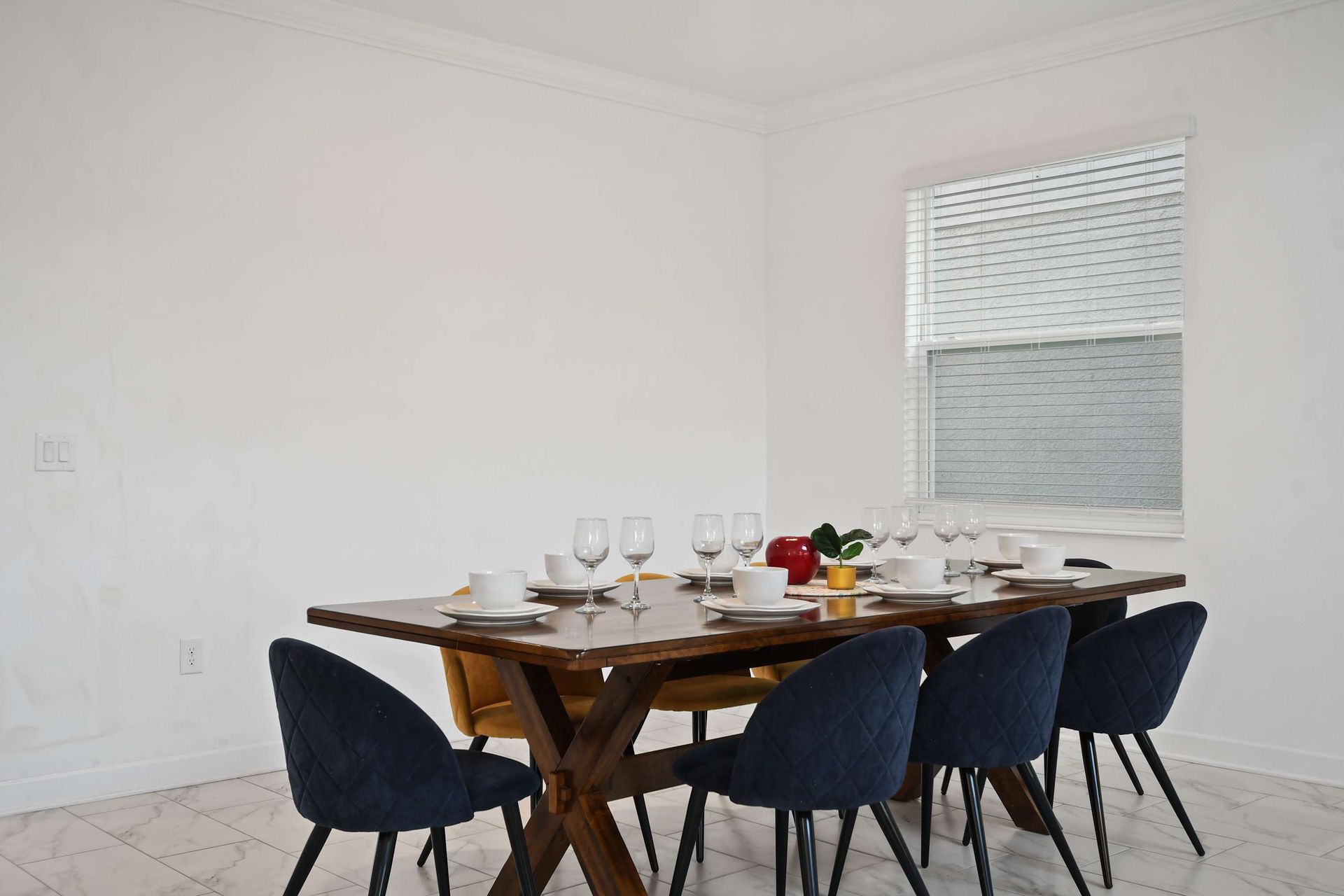 Elegant dining area with seating for eight, perfect for family meals or gatherings.
