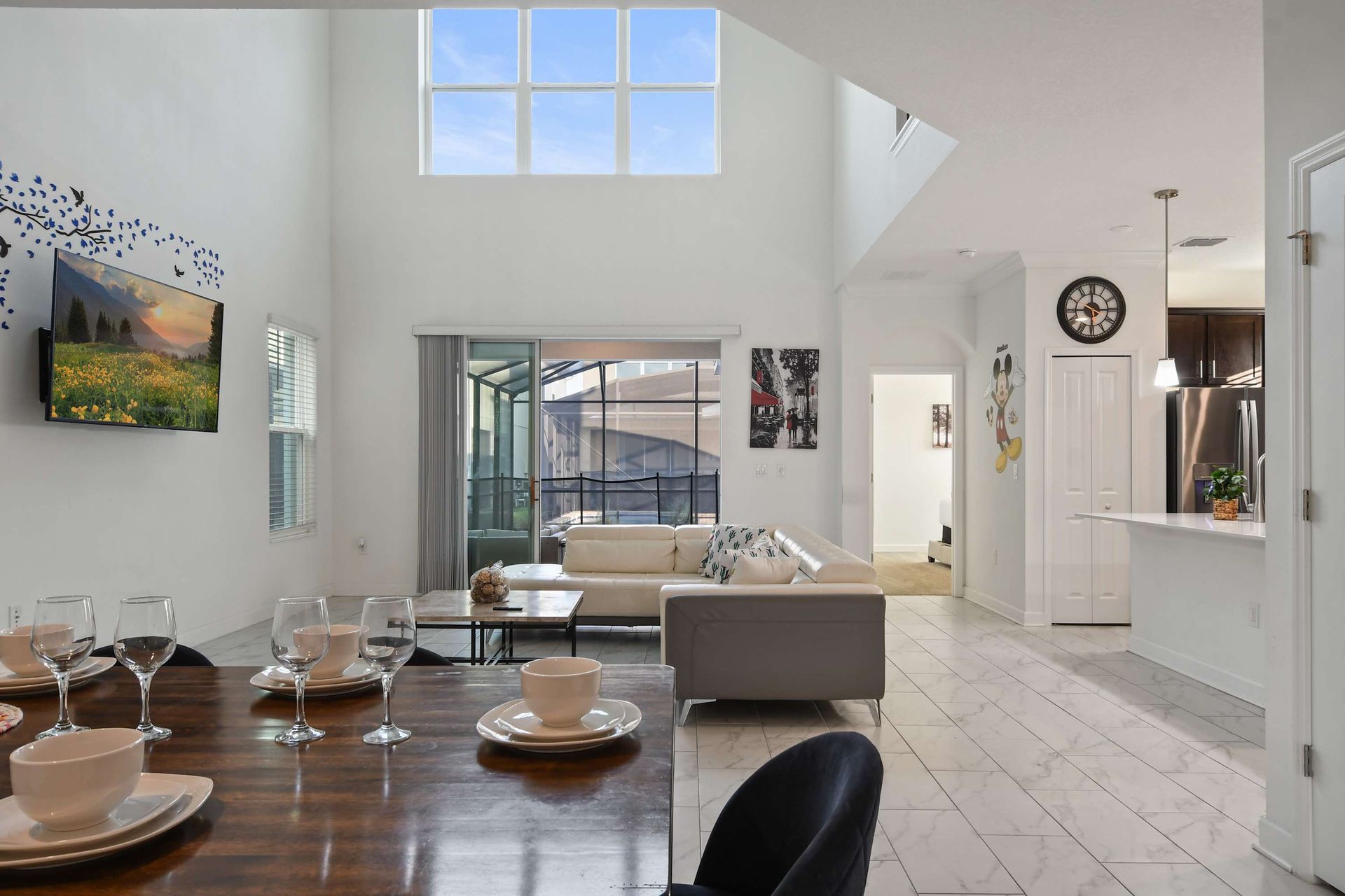 Bright, family-friendly space with soaring ceilings and seamless indoor-outdoor flow.