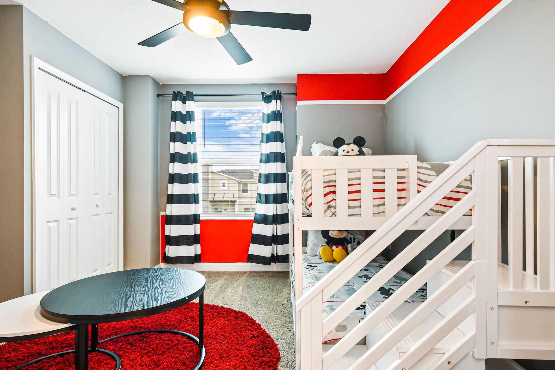 Vibrant kids’ room with playful bunk beds, bold colors, and cozy reading nook vibes.