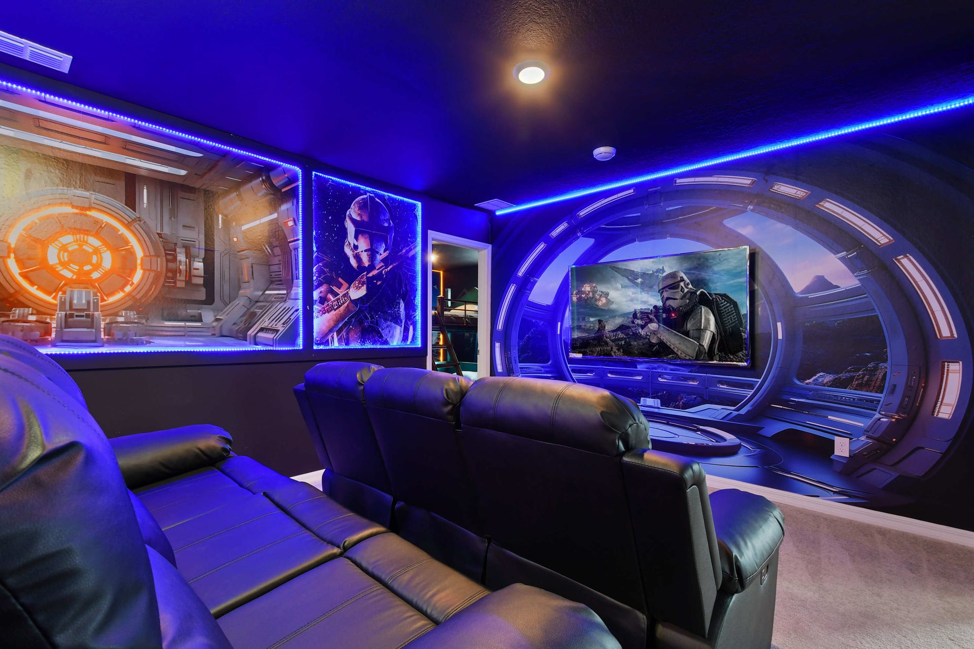 Epic space-themed home theater with reclining seats and immersive LED lighting!
