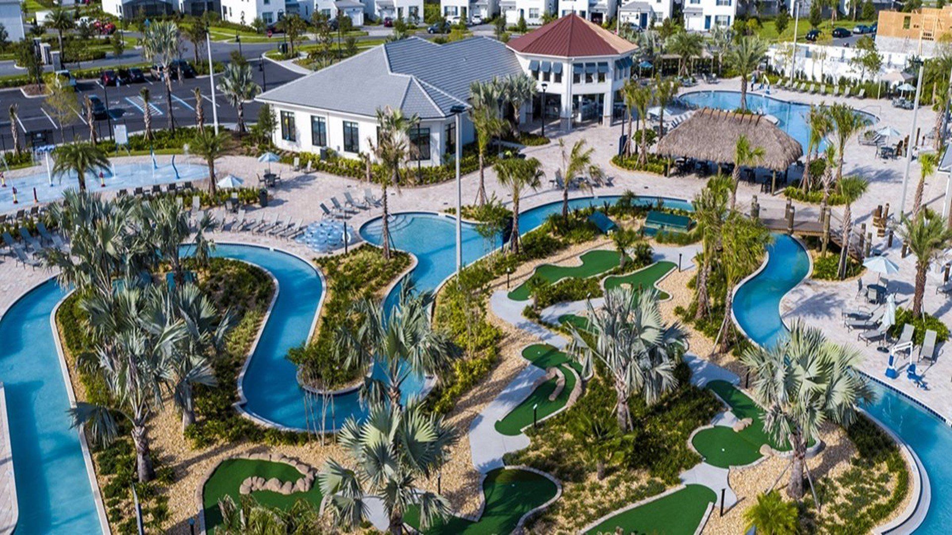 Indulge in ultimate relaxation as you float in the sun-kissed waters of the resort lazy pool, offering a serene retreat.