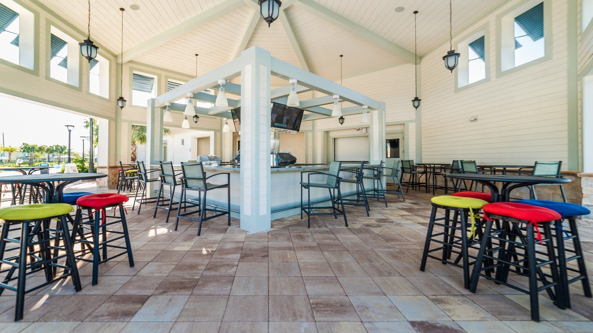 Indulge in refreshing drinks and snacks at the resort poolside bar, offering you a delightful way to unwind and enjoy the sunny ambiance during your stay.