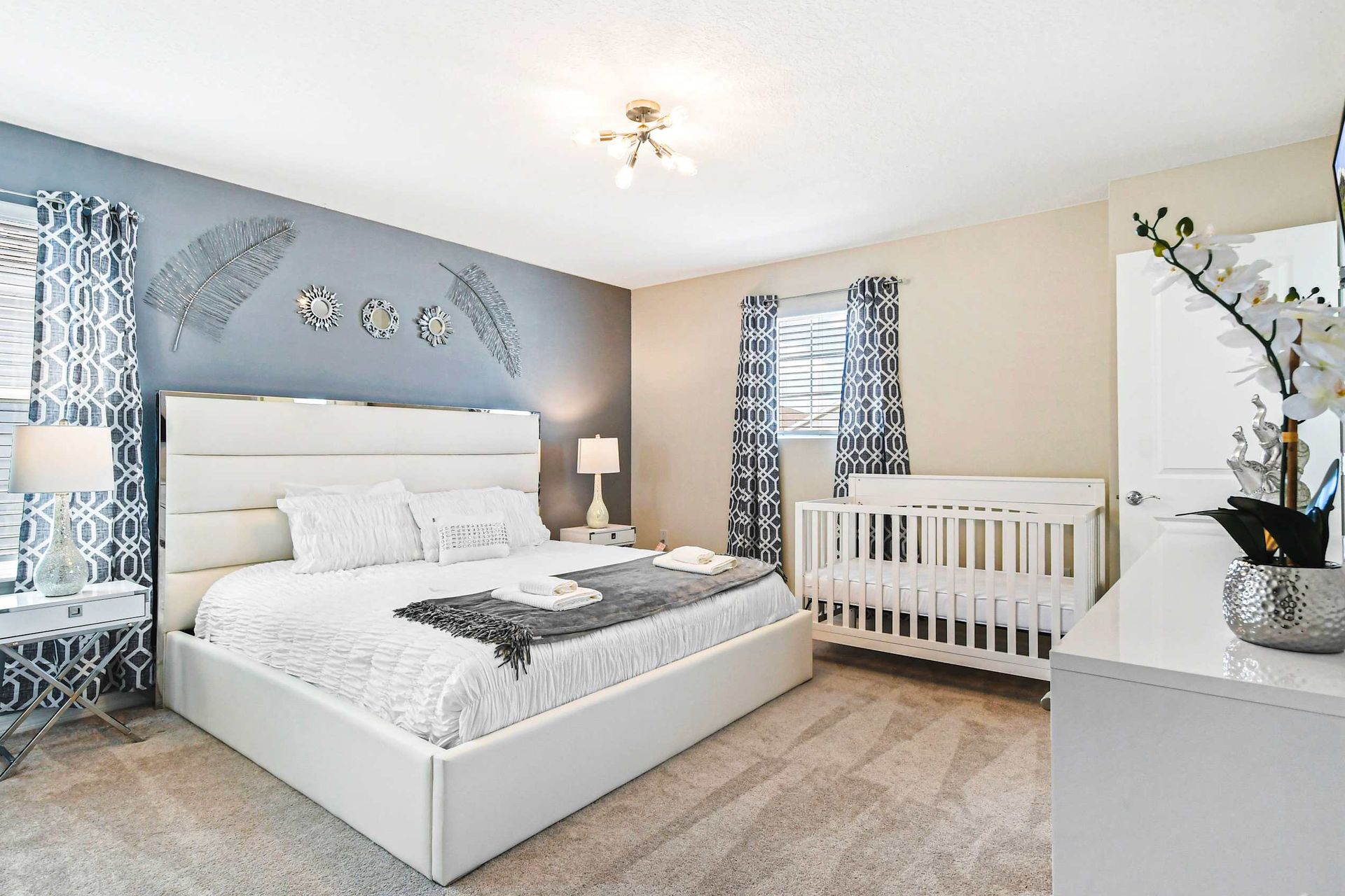 Room for the whole crew! This comfy haven boasts a king-sized bed for grown-up relaxation and a crib for little dreamers. Sweet dreams guaranteed!