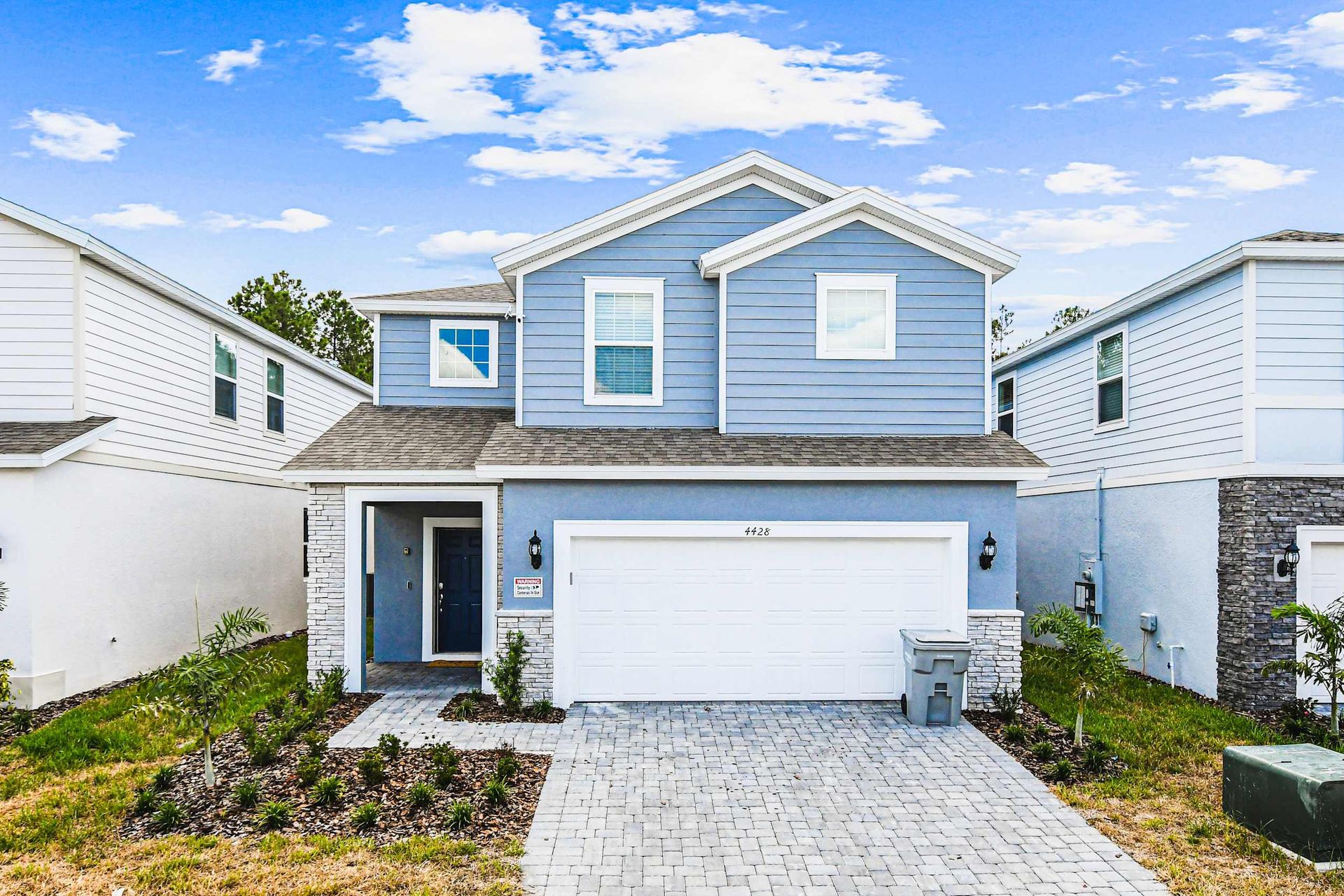 Modern 2-story home with garage, stylish curb appeal, and family-friendly vibes