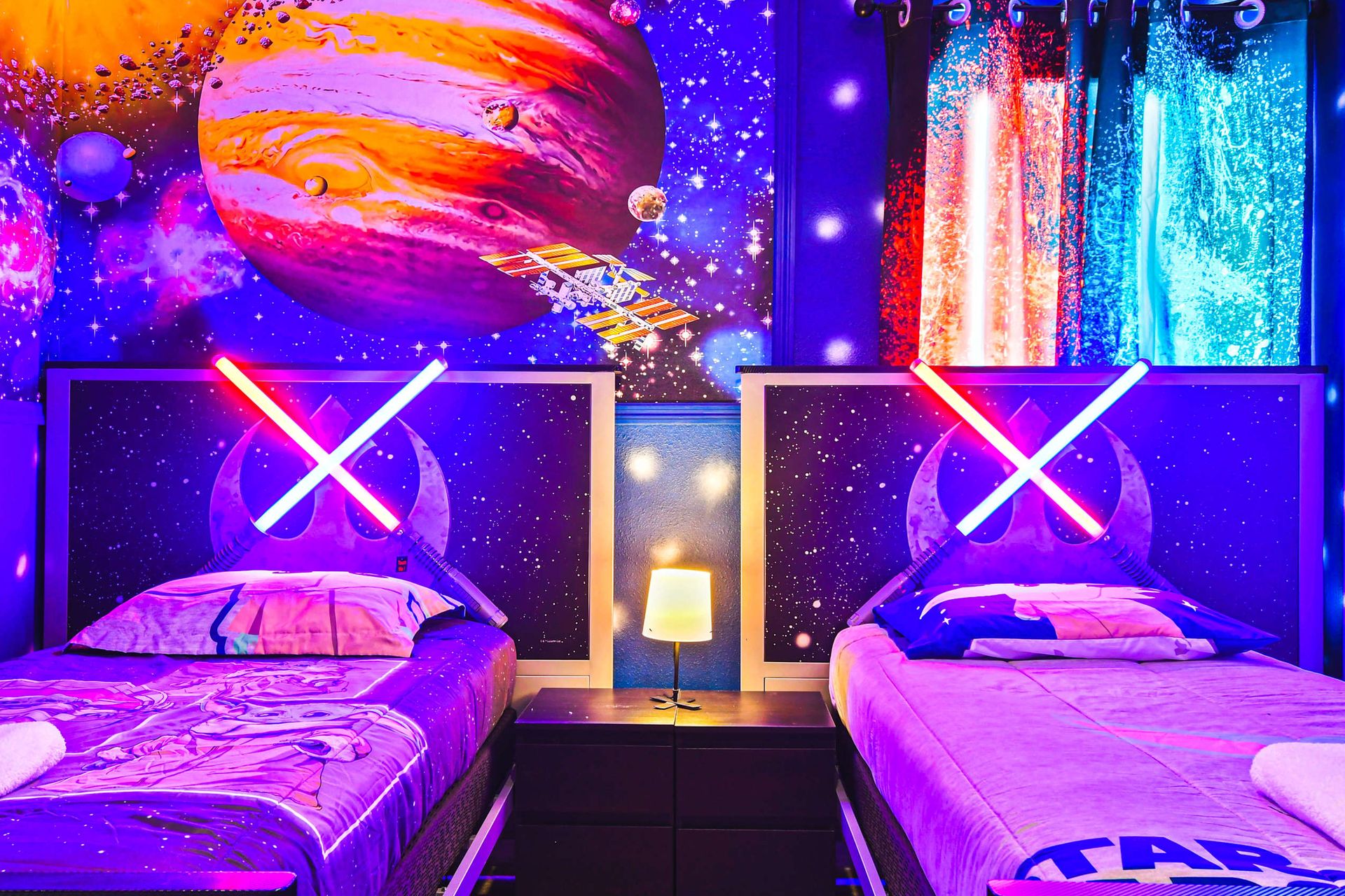 Relax and rejuvenate in our inviting Star Wars themed bedroom, providing you with a comfortable retreat after a day of adventure.