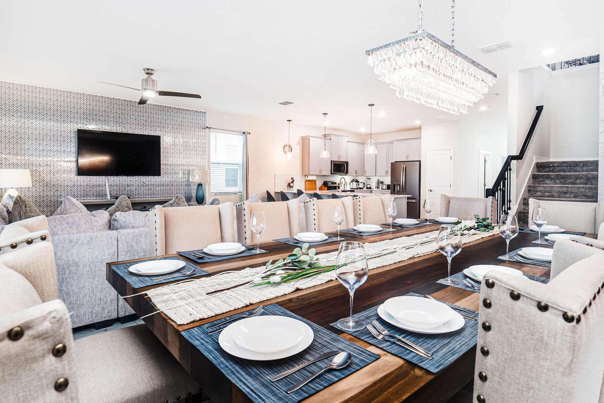 The dining area generously accommodates everyone with a grand 12-seater dining setup.