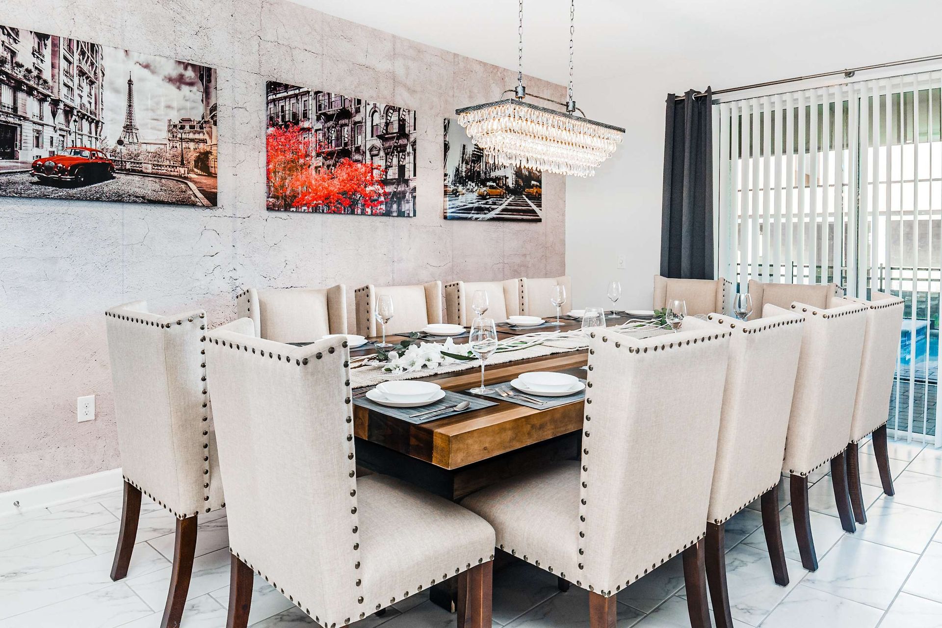 The dining area generously accommodates everyone with a grand 12-seater dining setup.