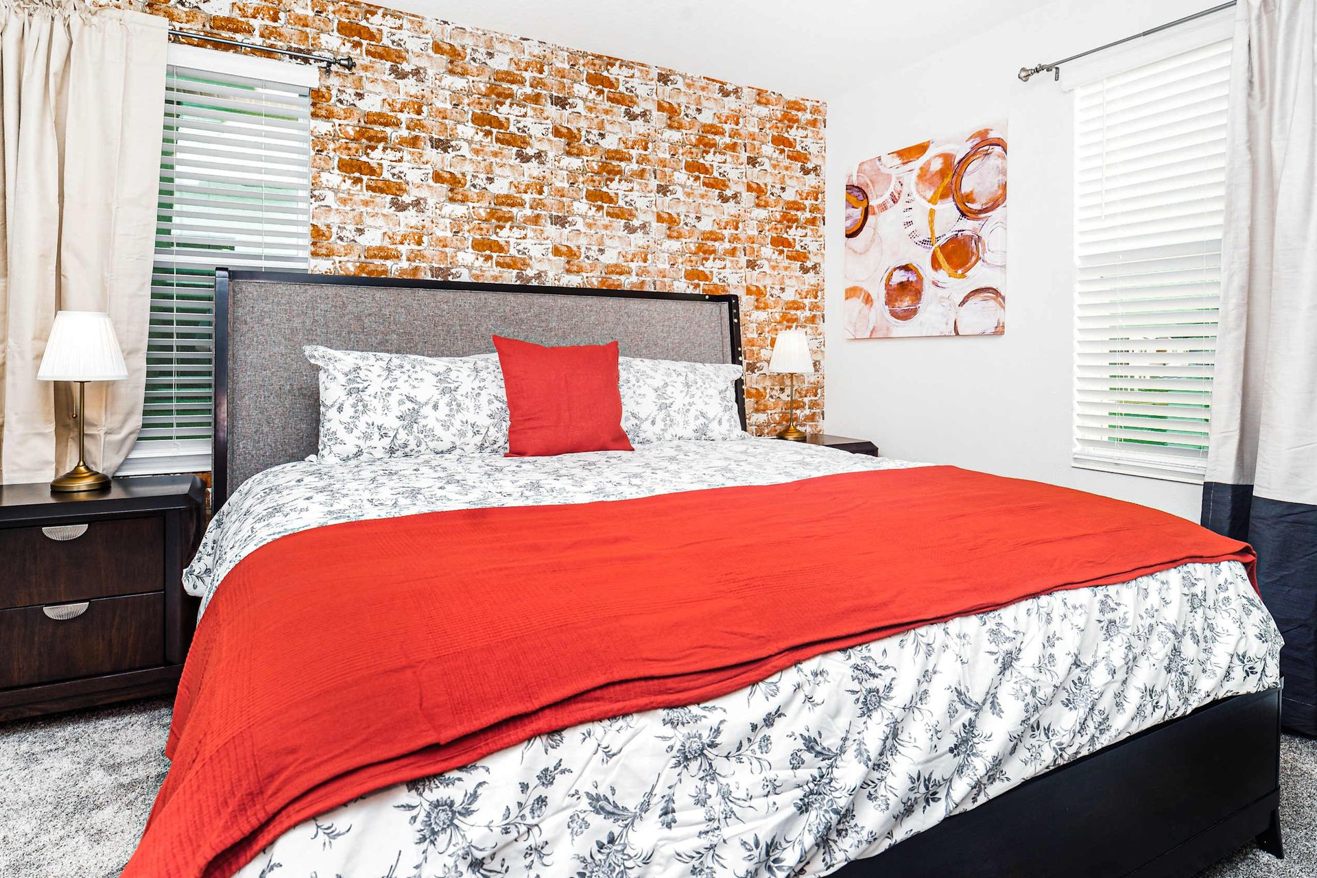 Unwind in a tranquil and supremely comfortable king bedroom, where soothing tones, plush furnishings, and thoughtful design converge to create a serene retreat.