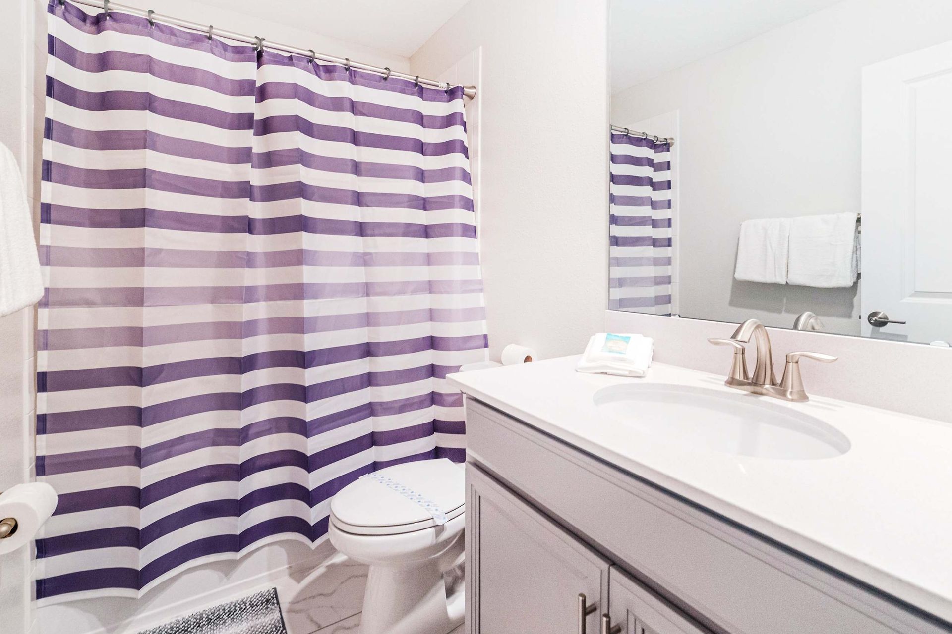 Indulge in the luxury of a full bathroom, complete with modern amenities and elegant finishes.