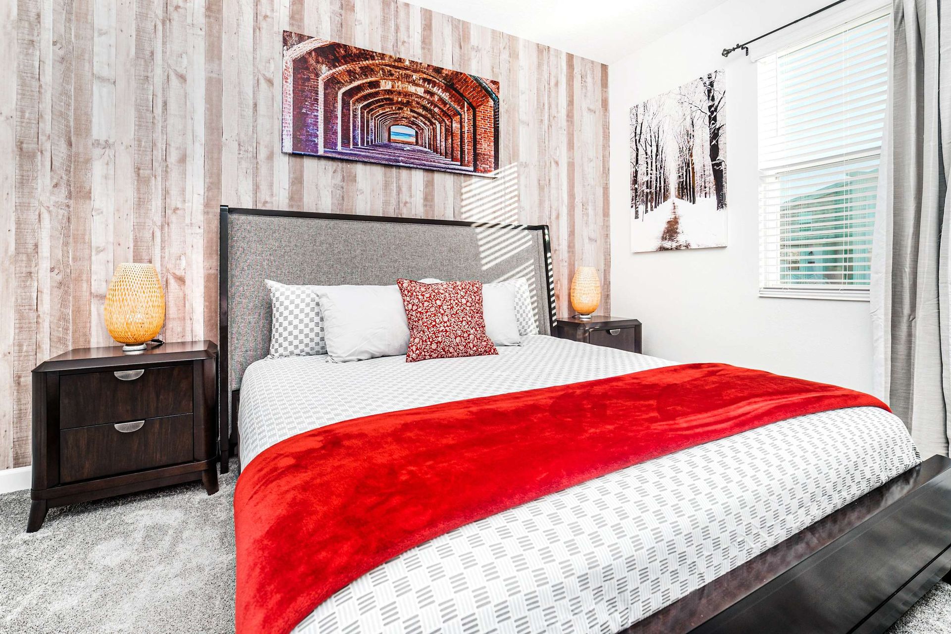 Experience the epitome of comfort in a cozy bedroom, where plush textiles, subdued lighting, and tasteful decor converge to create a warm and inviting sanctuary.