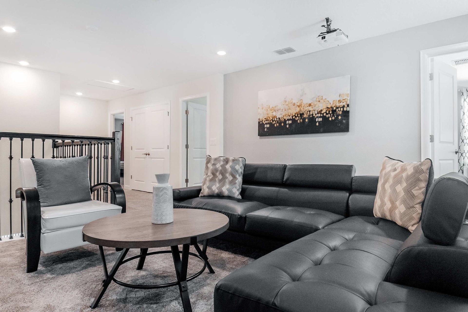 Chic lounge area with modern decor, plush seating, and a cozy, neutral palette.