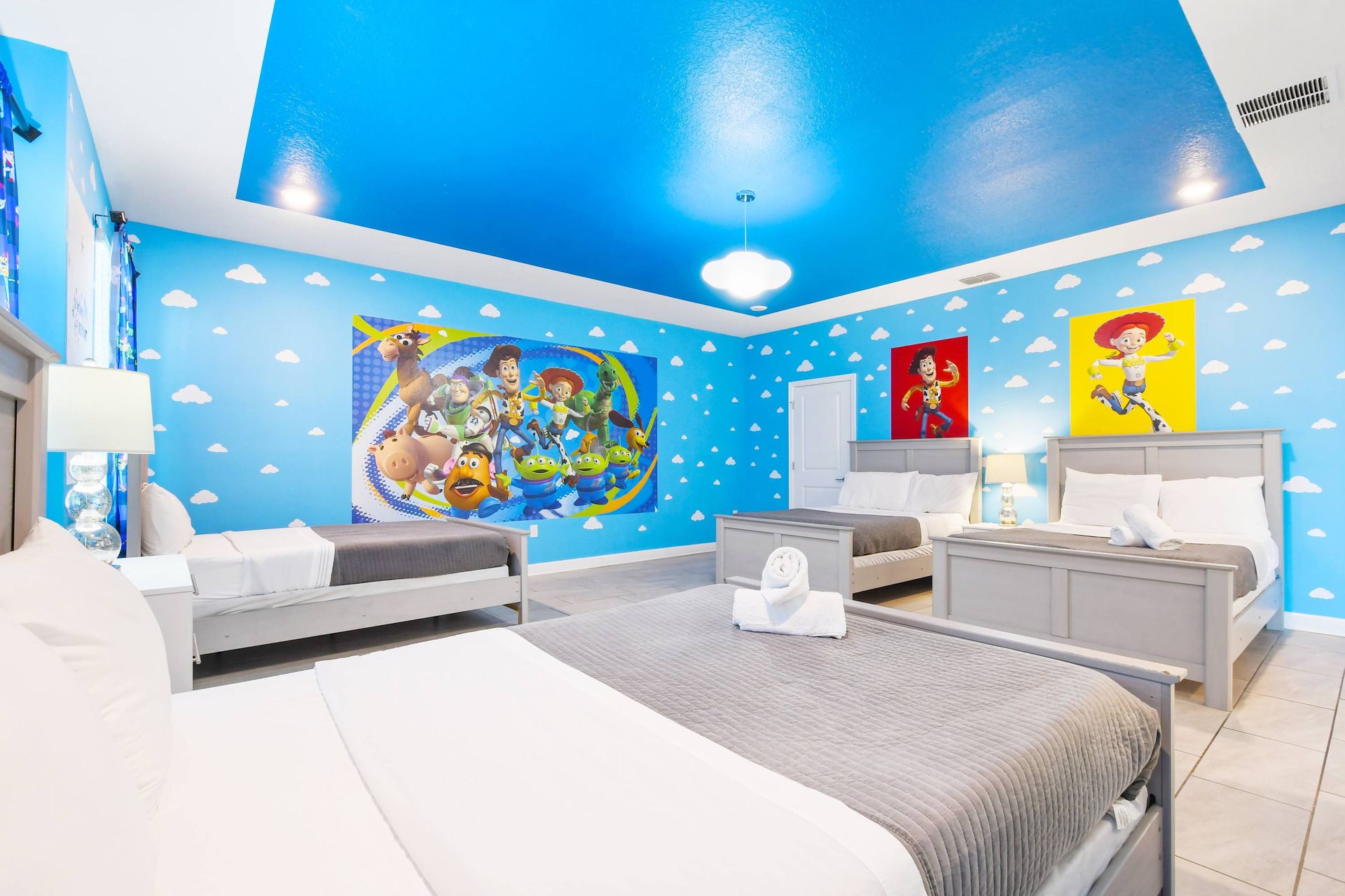 Toy-inspired bedroom with vibrant decor and plenty of beds!