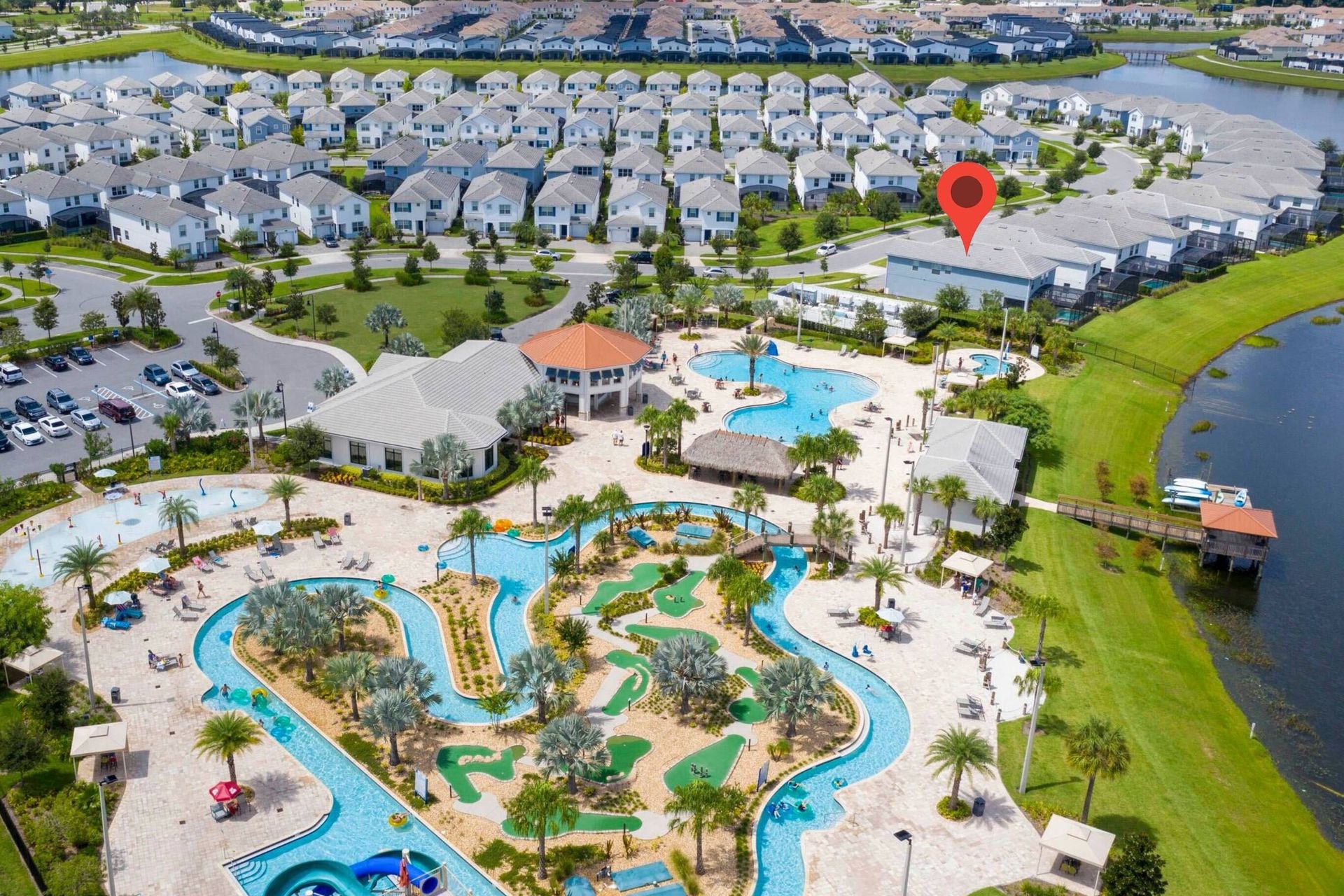 Resort Amenities - Indulge in ultimate relaxation as you float in the sun-kissed waters of the resort lazy river, offering a serene retreat just steps from your door.