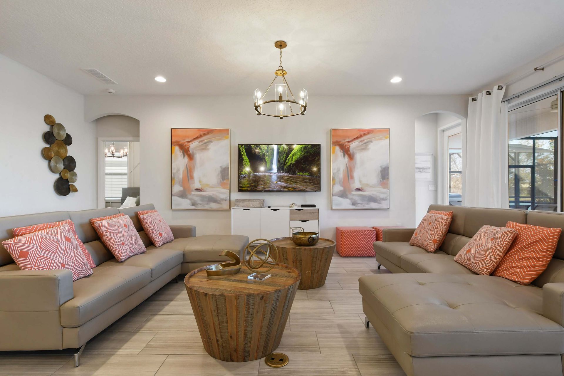 Spacious lounge with stylish accents, comfy sofas, and a smart TV