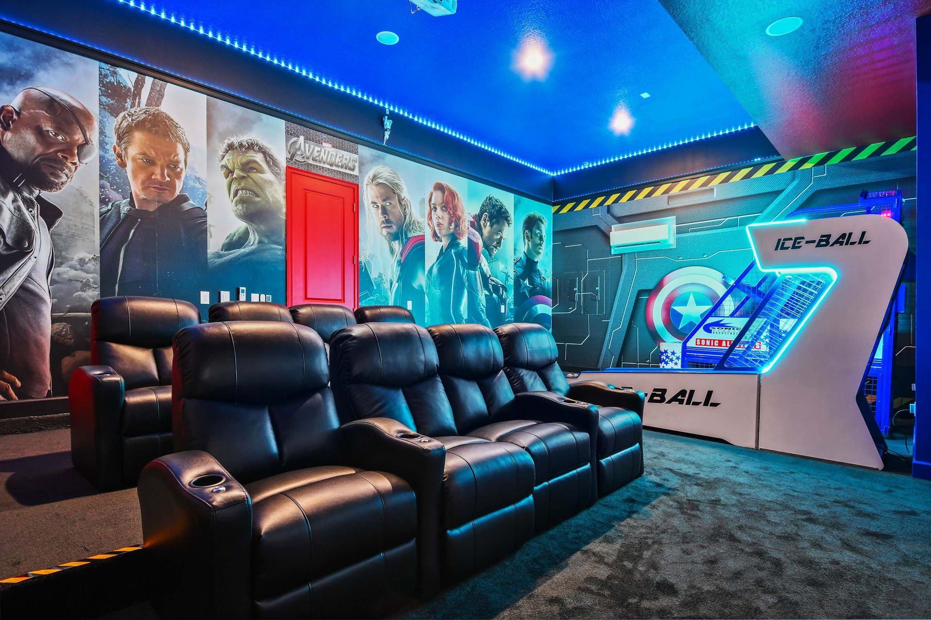 Experience cinematic thrills in the Marvel-themed private theatre. Enjoy movie nights with comfortable theater seating and a big screen for an immersive viewing experience.