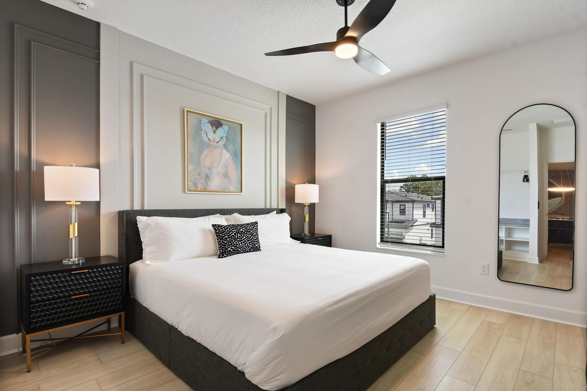 Modern elegance meets comfort in this king suite with chic décor and natural light.