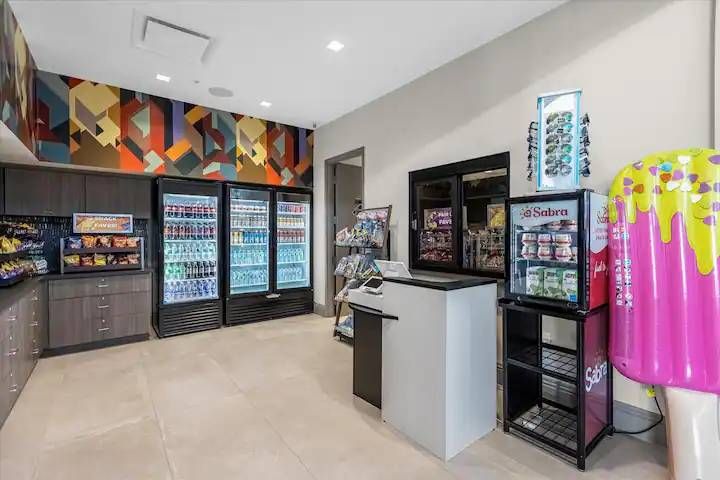 Convenient on-site market stocked with snacks, drinks, essentials, and souvenirs.
