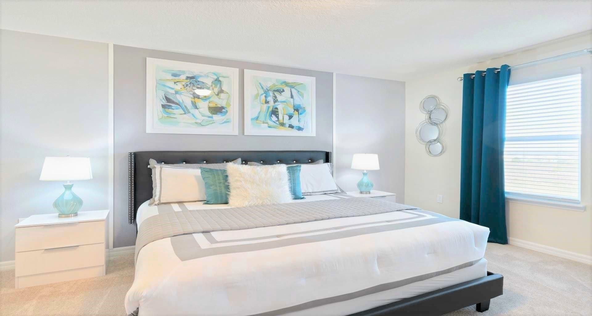 Tranquil king-sized bedroom designed for serenity, offering a peaceful and comfortable space for a restful night's sleep