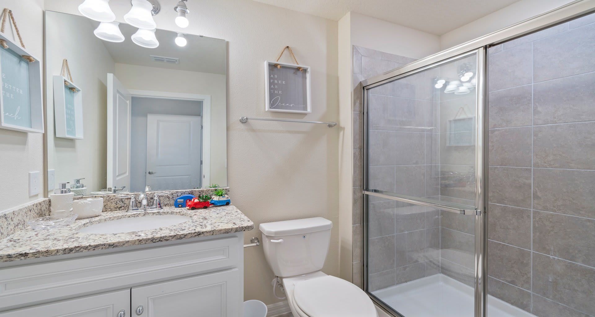 Complete bathroom equipped with all essential fixtures, offering a comprehensive space for personal hygiene.