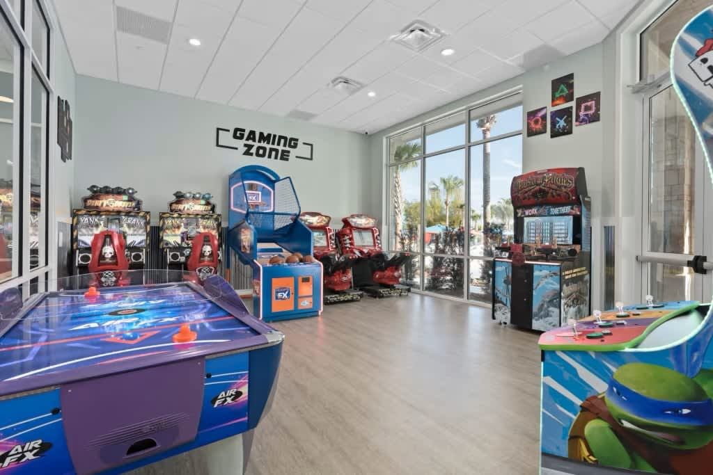 Resort Amenities - Experience endless fun and excitement at the resort arcade, offering you a variety of games and entertainment options to enjoy during your stay.
