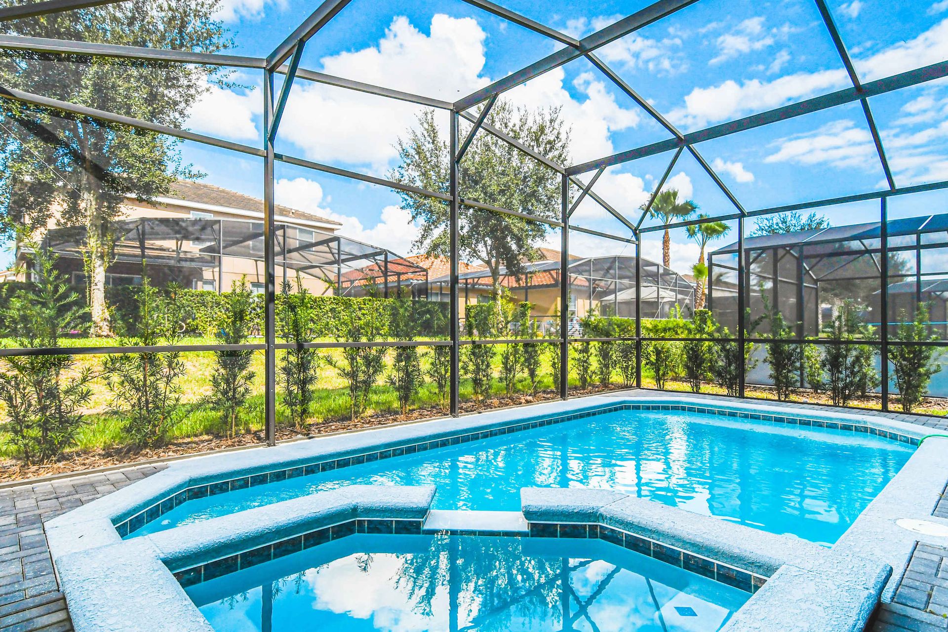 Sunlit, screened pool paradise for endless summer fun!
