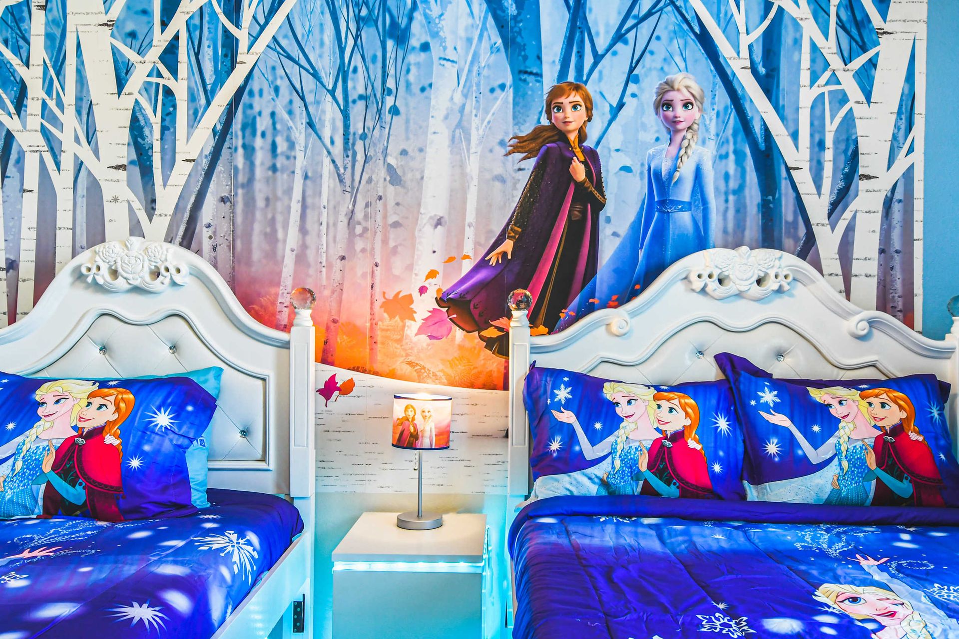 Enchanting frozen-themed room where dreams of magical winter adventures come to life, perfect for little princesses!