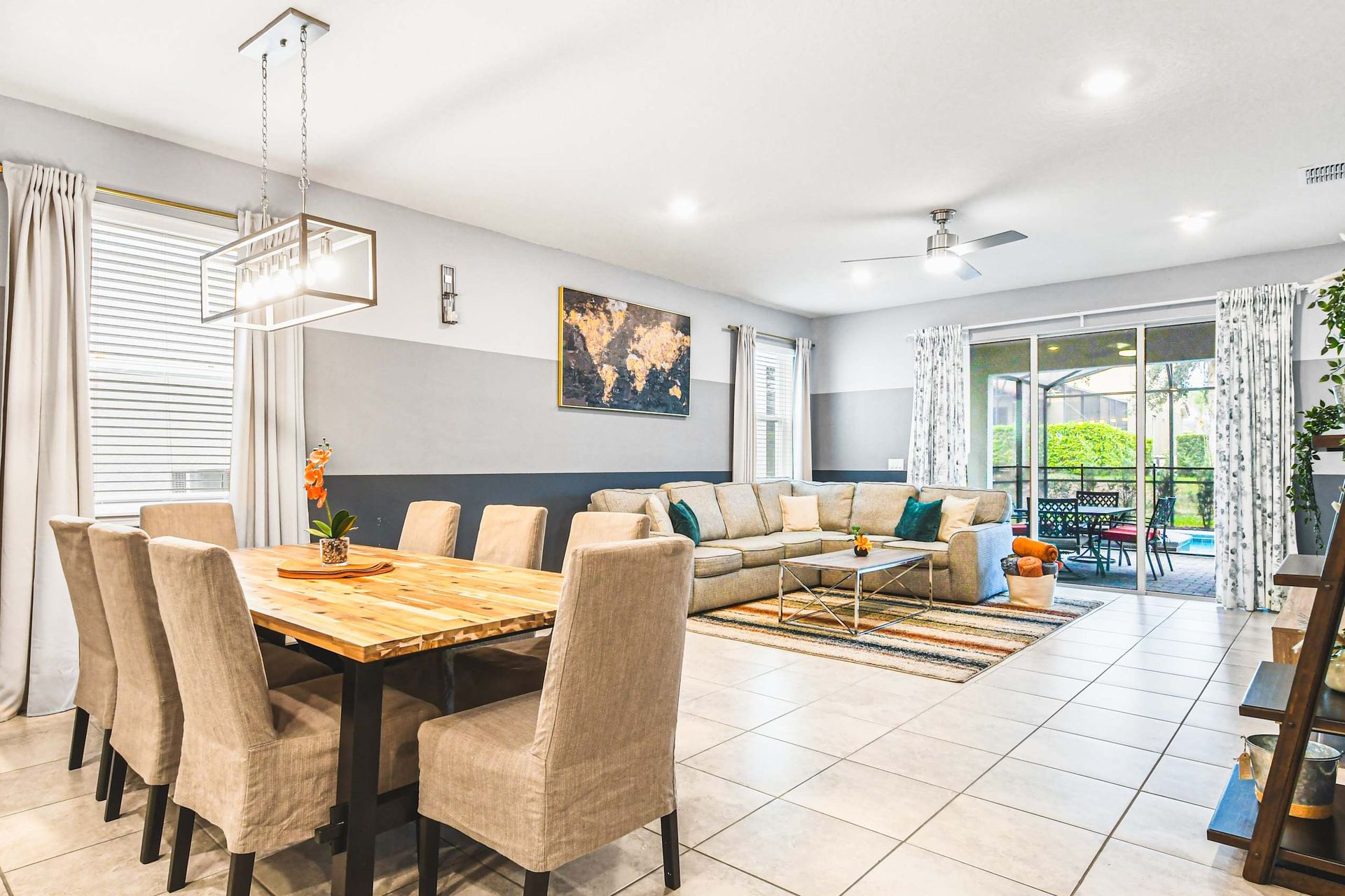 Stylish, airy dining area flows into a cozy lounge, perfect for family meals and relaxed evenings overlooking the pool.