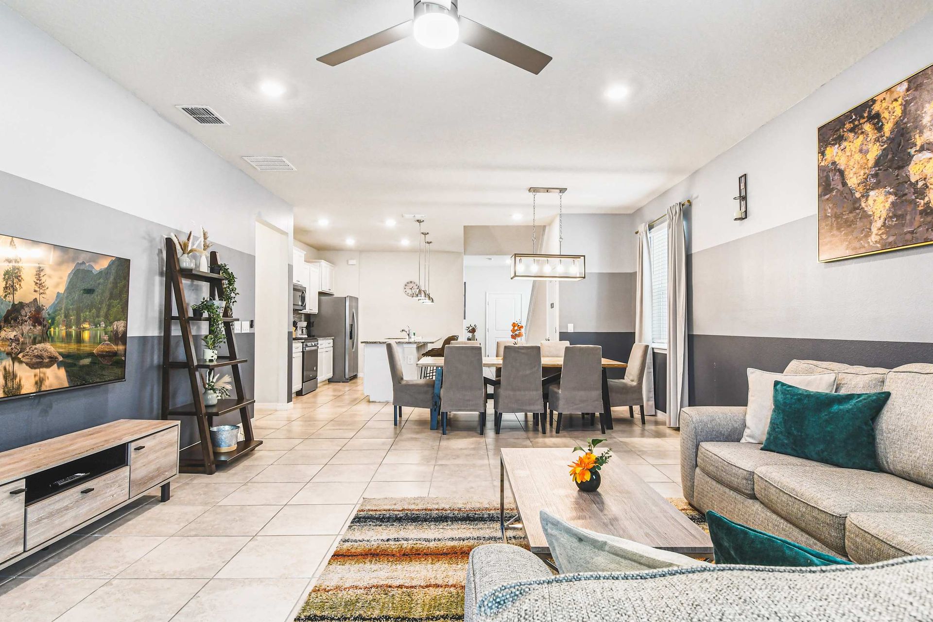 Modern open-plan living at its best! Chic dining space meets comfortable lounge for stylish, functional family living.