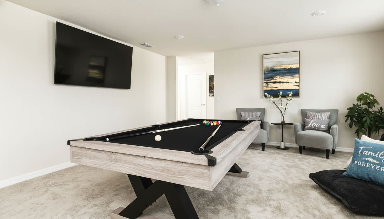Elegant entertainment lounge featuring a bespoke pool table and sophisticated modern decor.