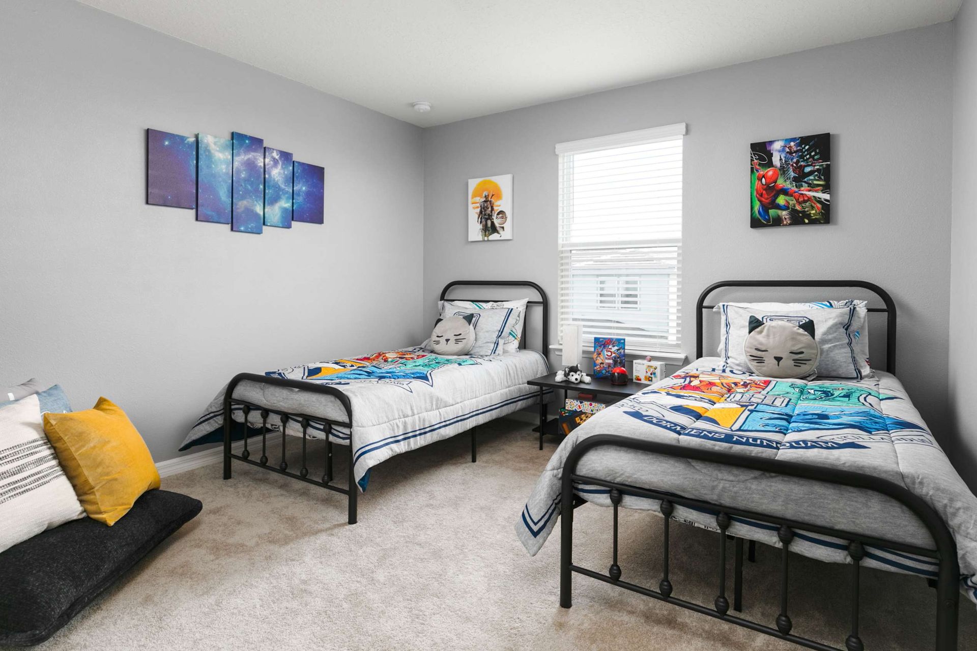 Inspiring young imaginations in a stylishly themed twin bedroom designed for comfort and play.