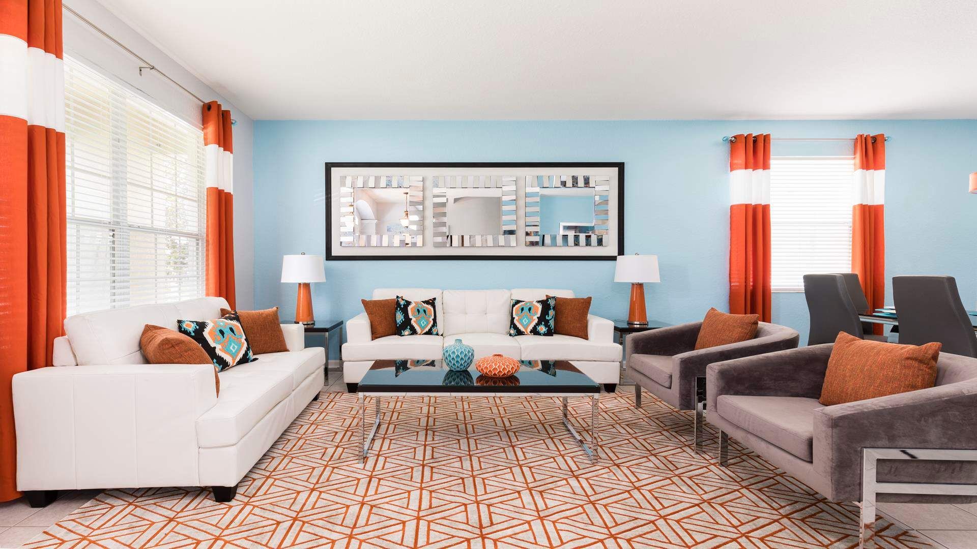 Spacious living room area with cozy sofa, perfect for family reunion