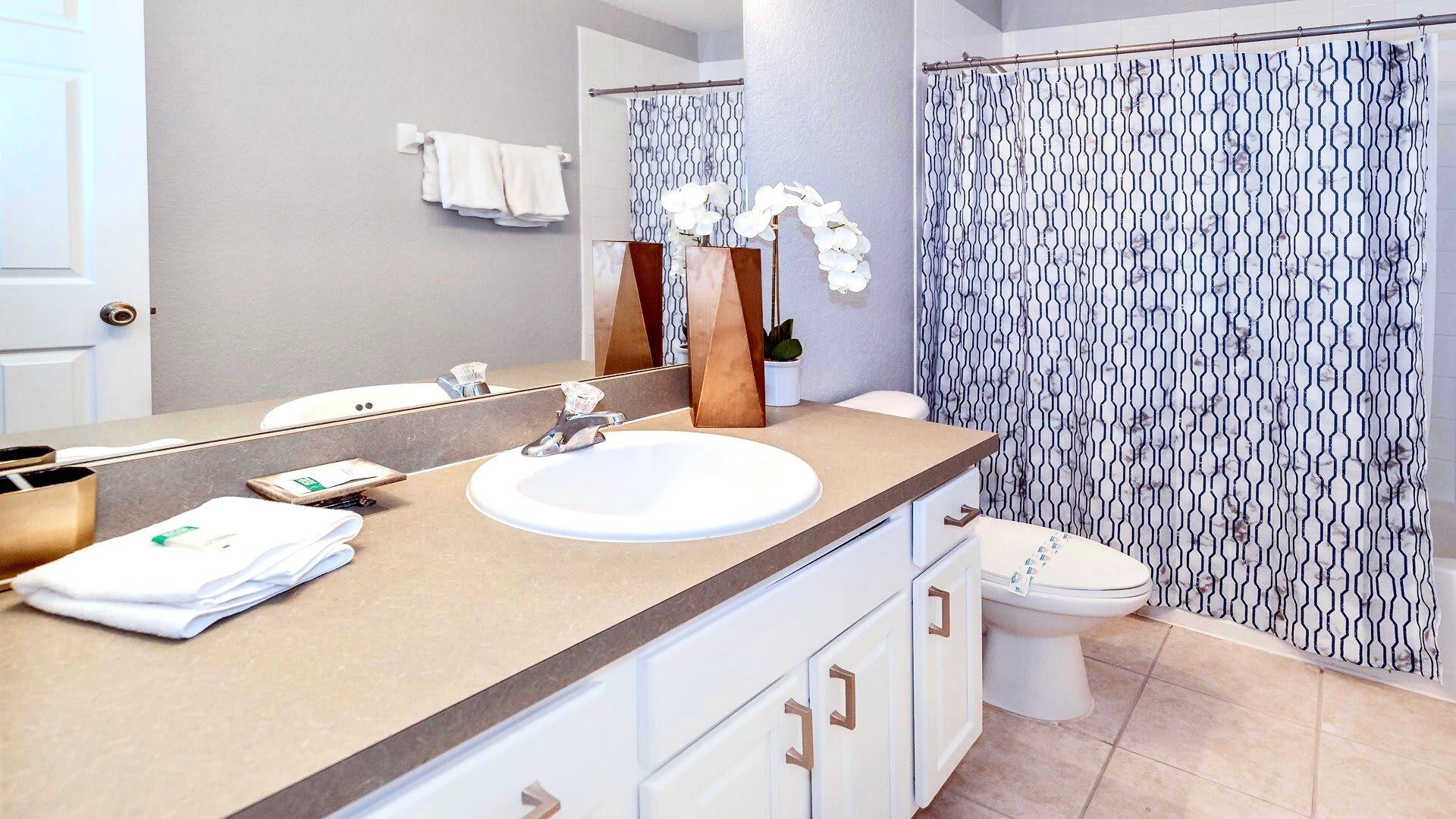 Pamper yourself in our elegant bathroom, offering you a relaxing oasis to unwind after a day of adventure.