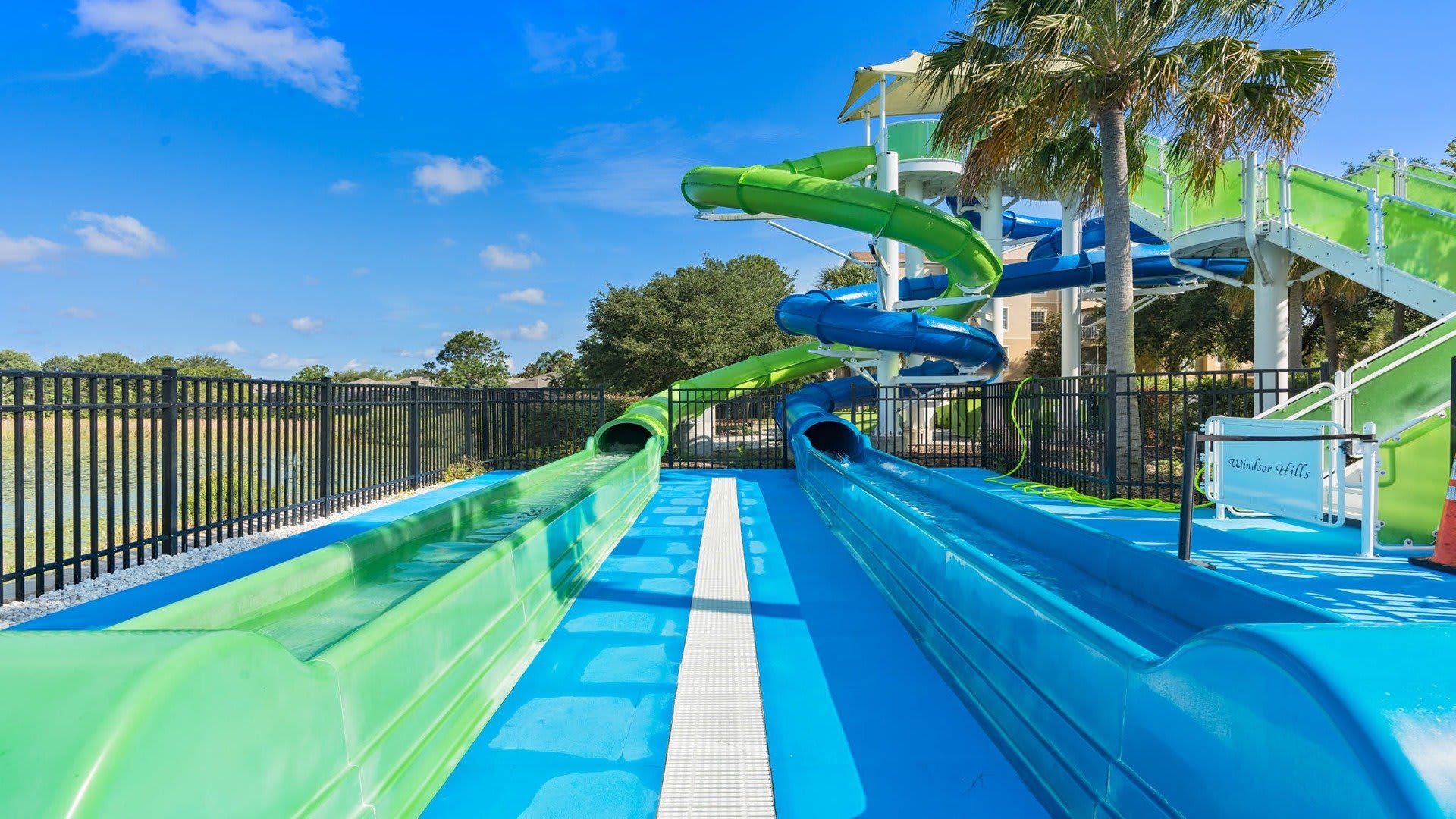 Resort Amenities - Experience the thrill of the resort pool slide, offering you a fun and exhilarating way to cool off and have a blast during your stay.