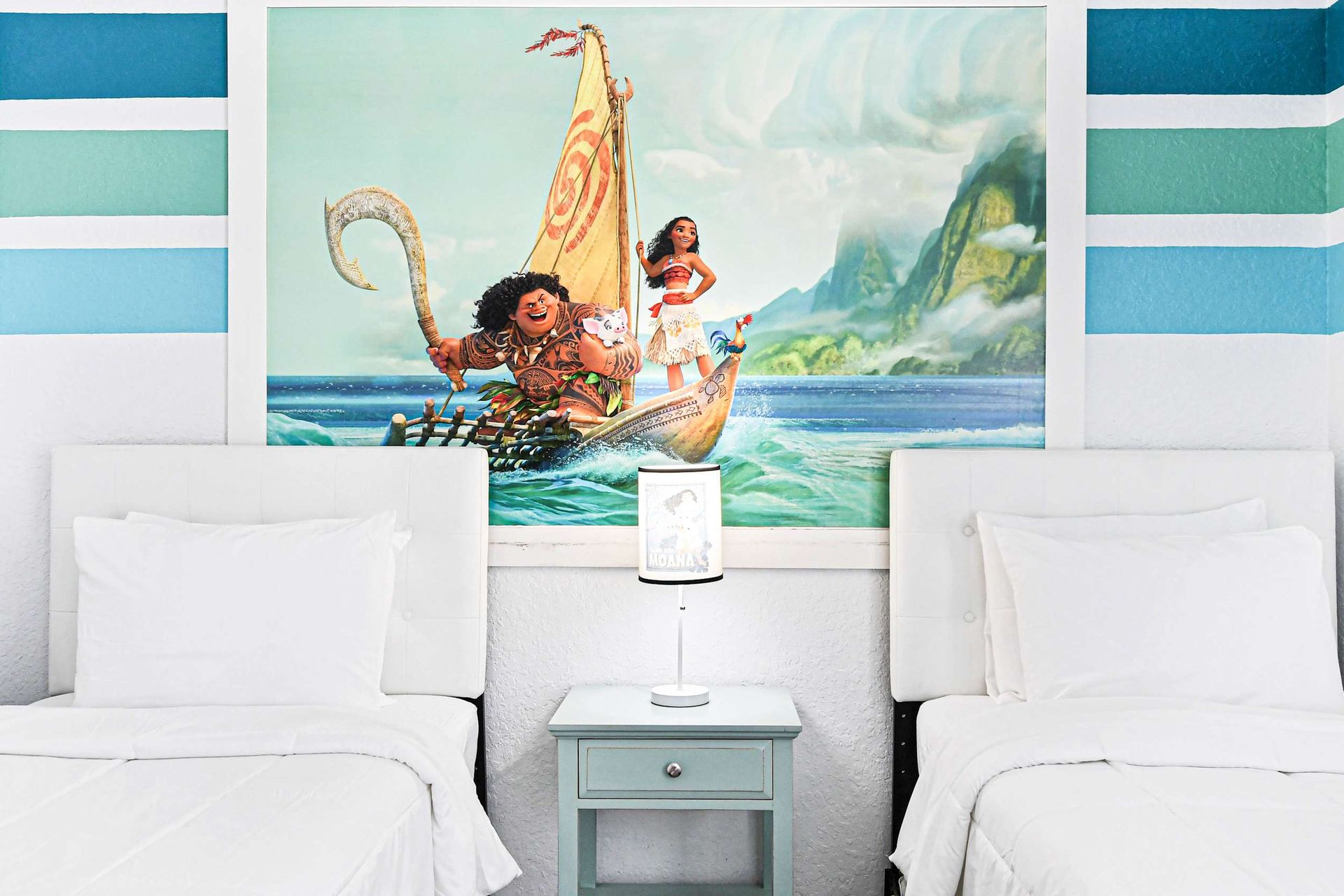 Bright Moana twin room with ocean vibes, perfect for adventurous young guests.