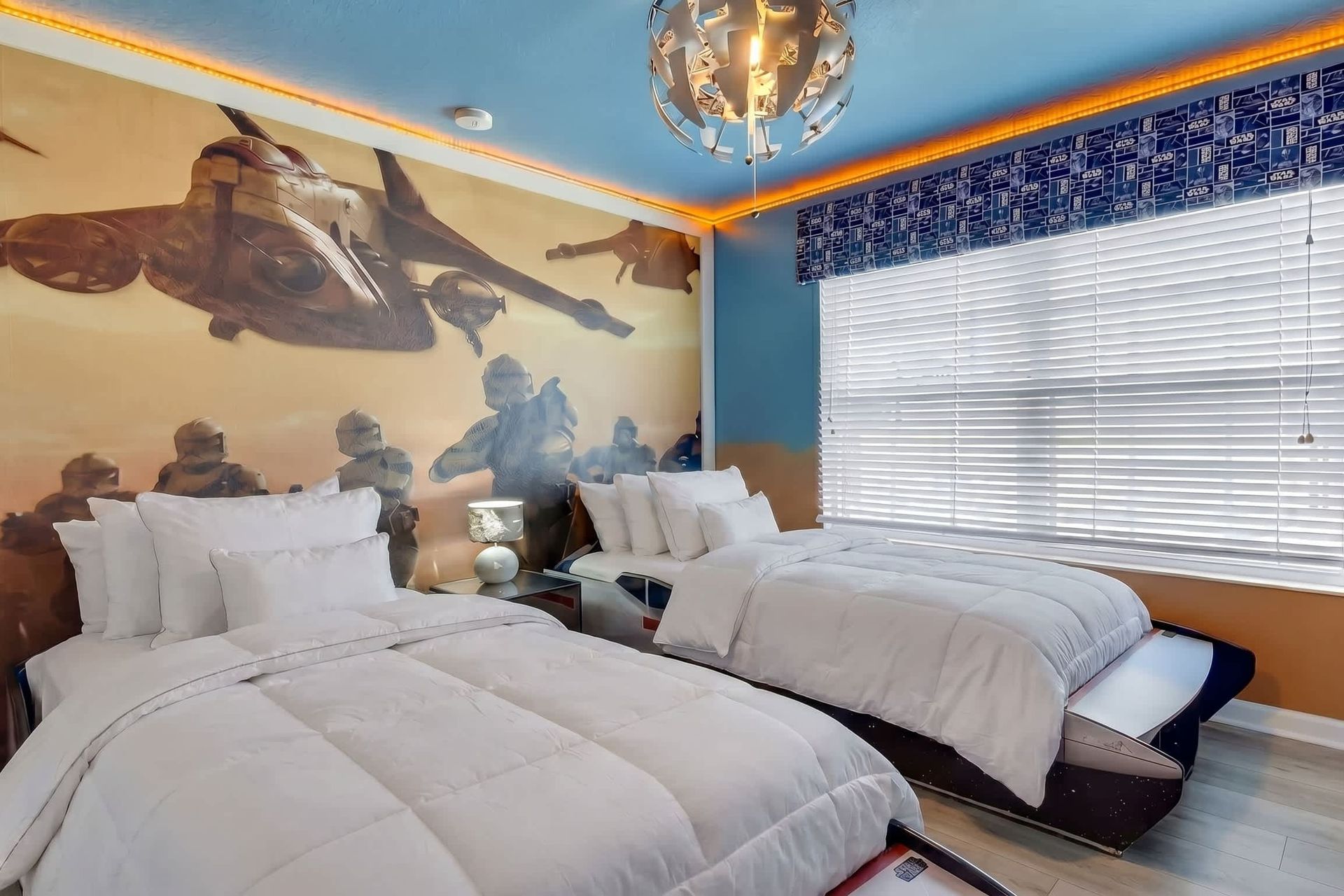 Enjoy the flexibility and comfort of our Star Wars Themed room with two twin beds, providing you with a cozy and restful retreat during your stay.