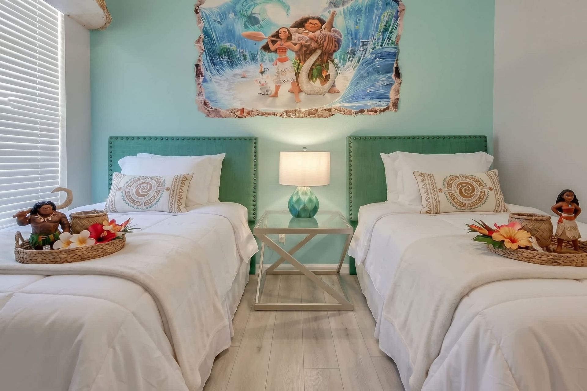 Experience a comfortable stay in our Moana inspired room with two twin beds, offering you the perfect space to relax and recharge after a day of adventure.