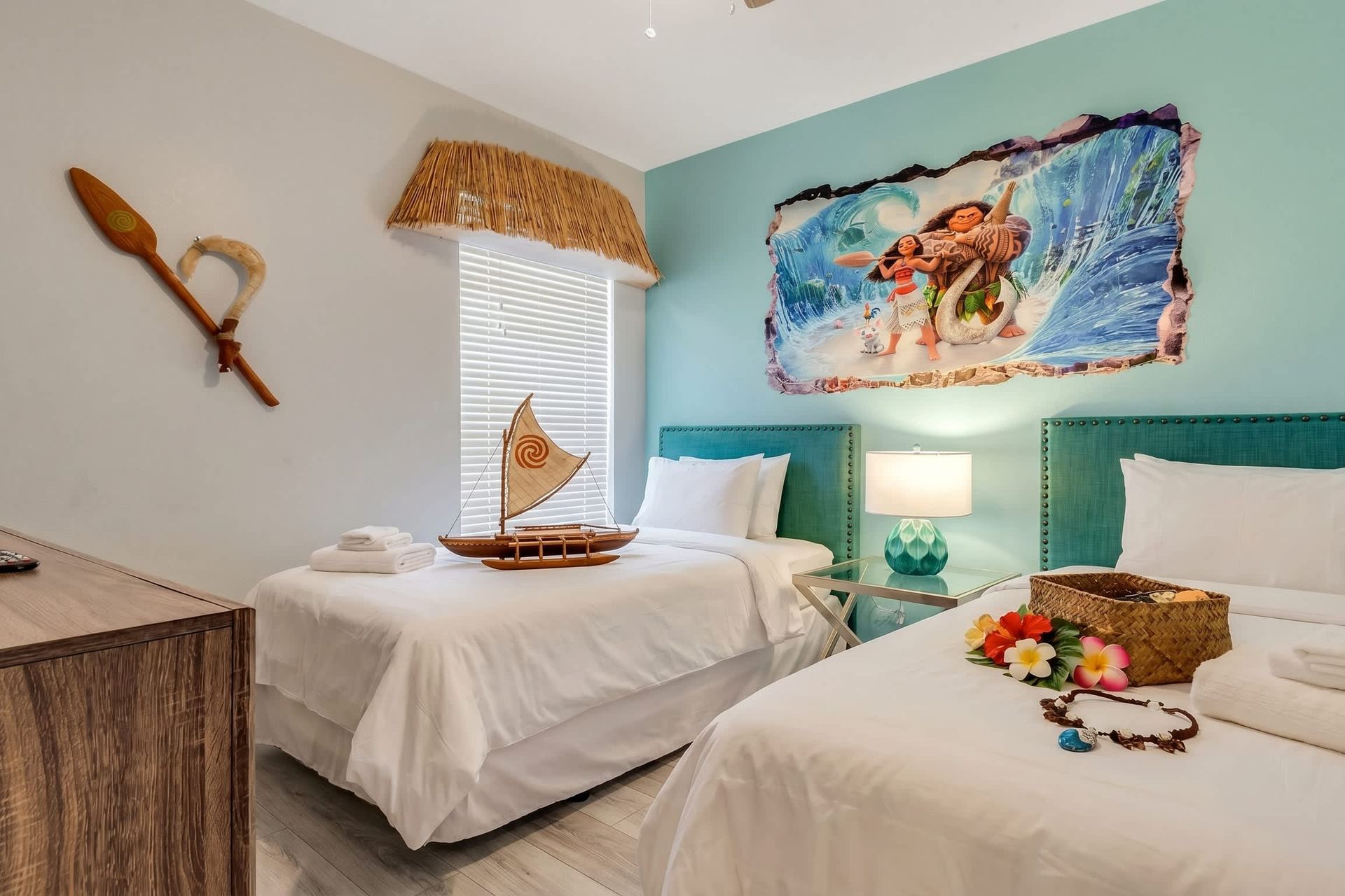 Relax in comfort in our Moana Themed room with two twin beds, offering you a convenient and inviting space to make the most of your stay.