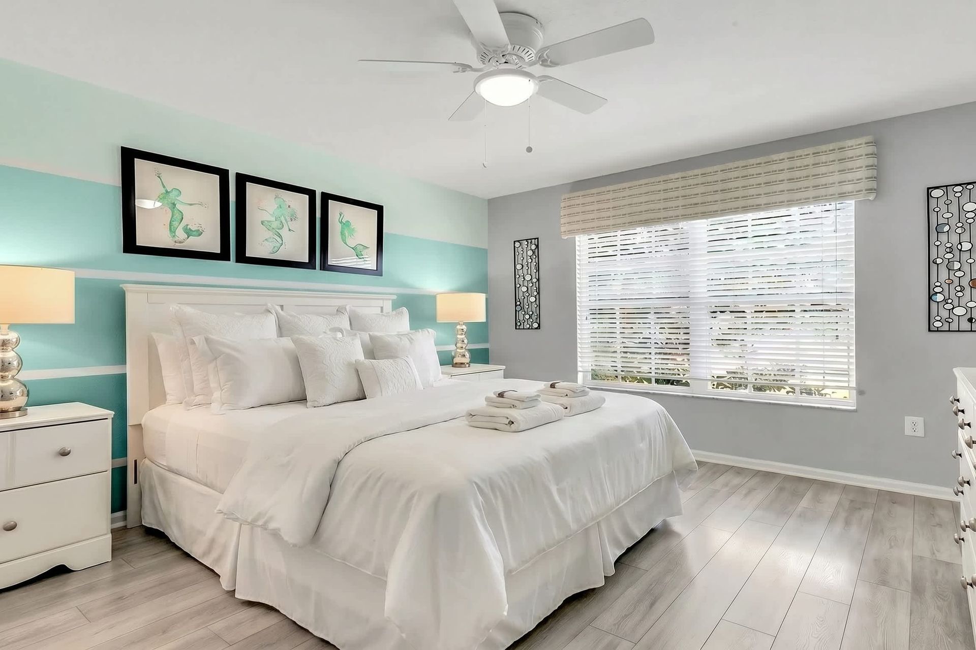 The spacious king bedroom with a Smart TV