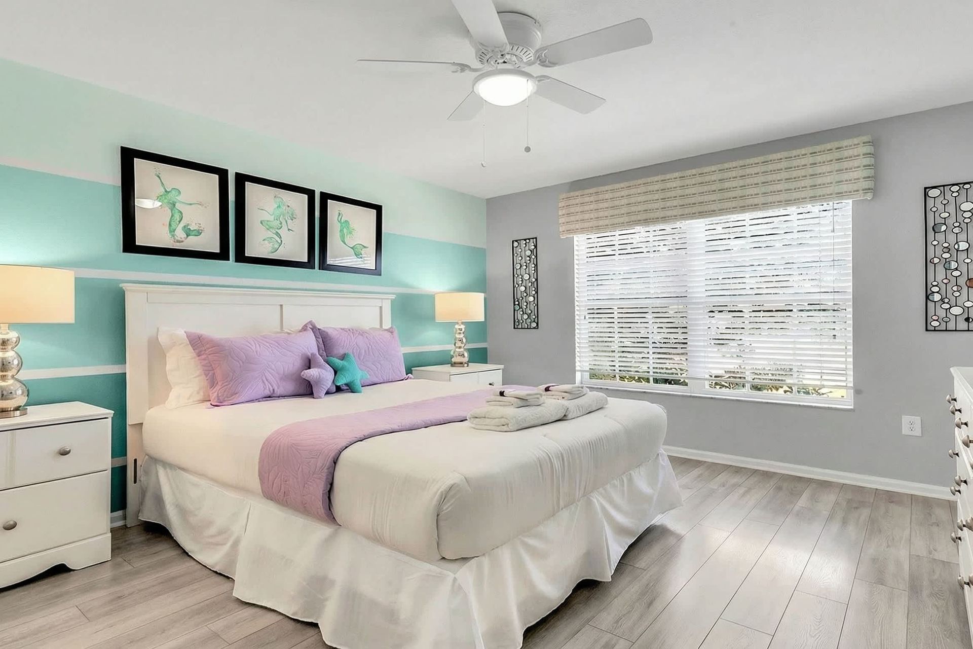 The spacious king bedroom with a Smart TV